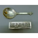 A 19th century Continental silver oblong box, the lid depicting children playing at jousting,