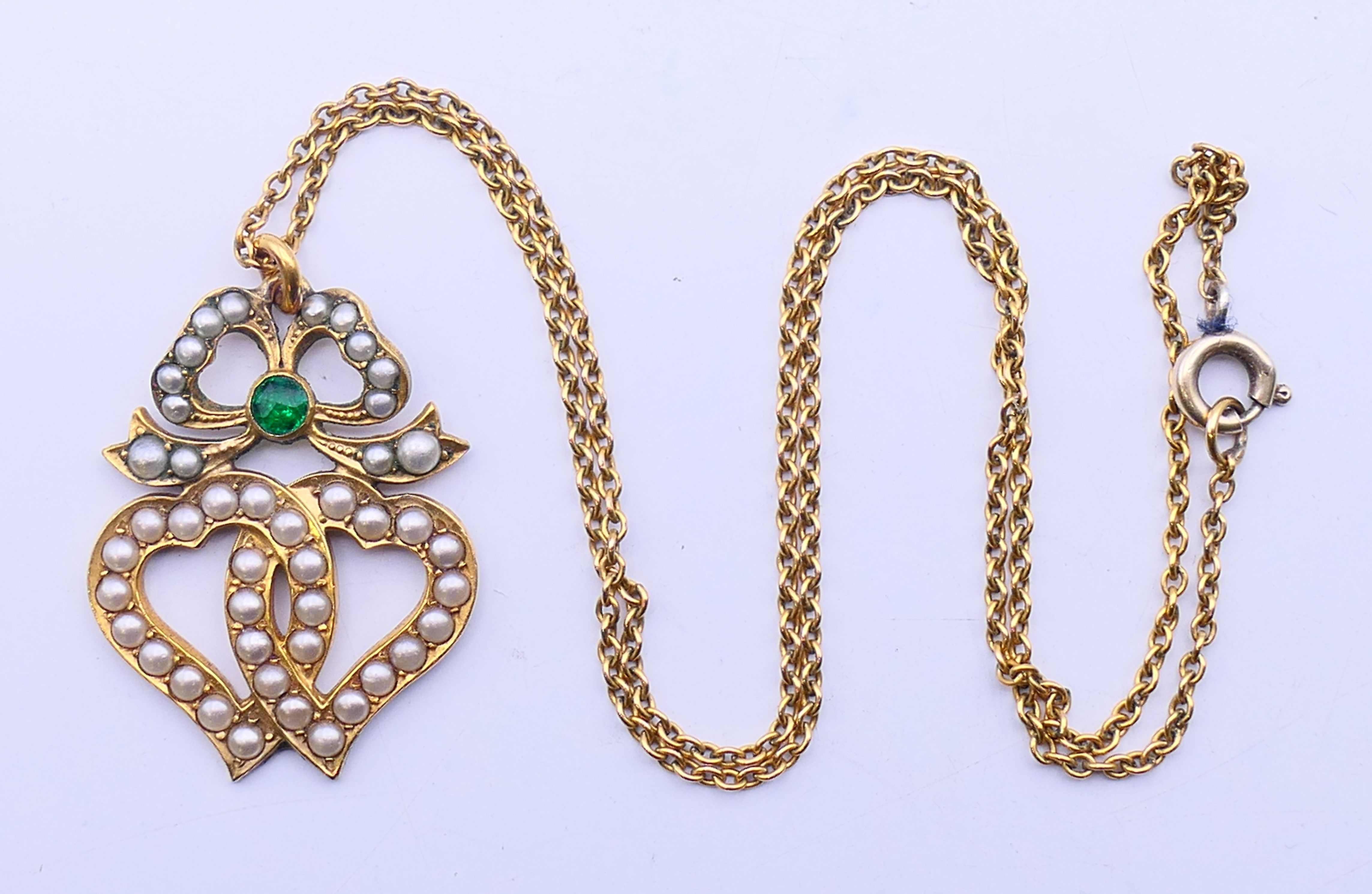Two Edwardian pendant necklaces, one on a 9 ct gold chain, and a gilt metal and amethyst bracelet. - Image 5 of 14