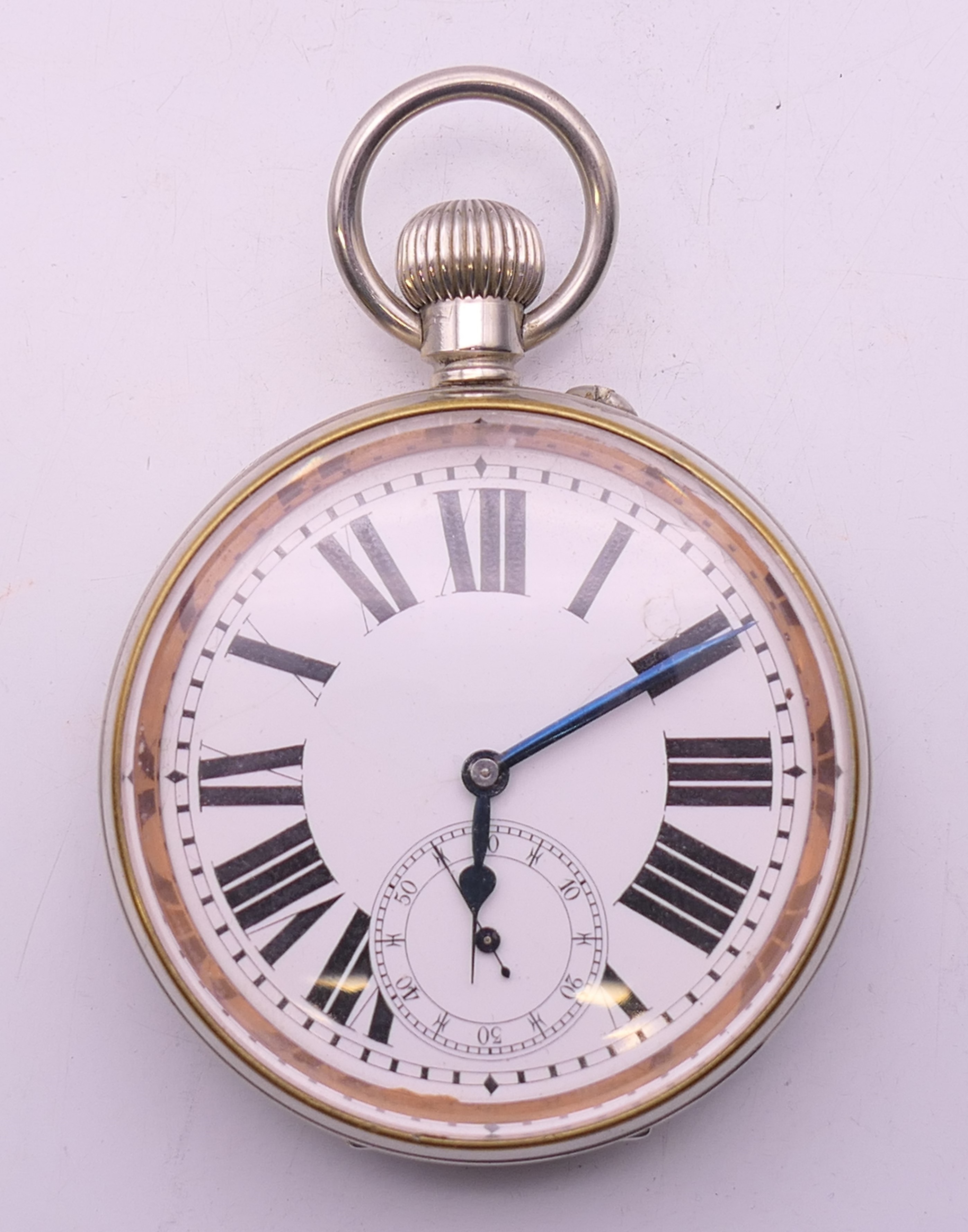 A Swiss silver plated Goliath pocket watch, housed in a silver-clad travelling case. - Image 2 of 9