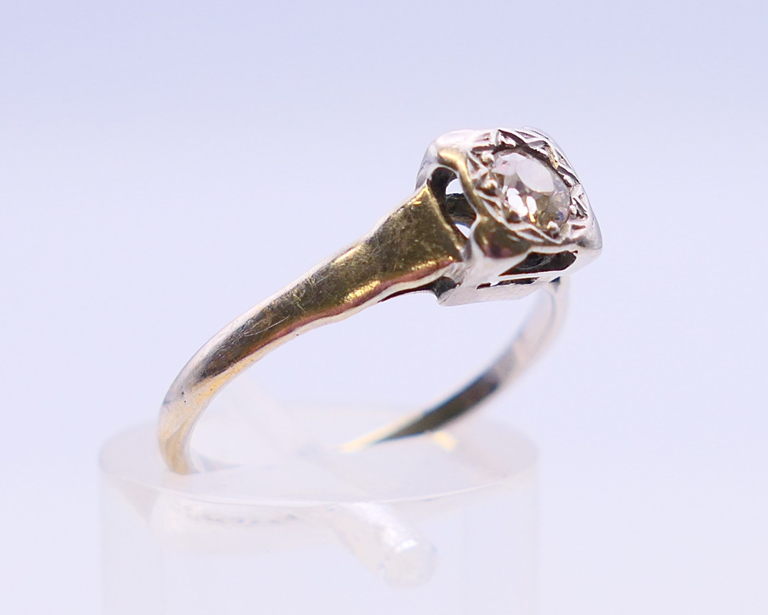 A platinum and diamond solitaire ring. Ring size L/M. - Image 3 of 8
