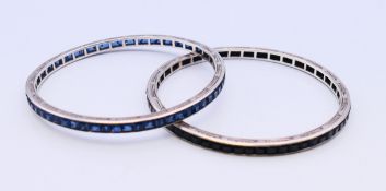 Two white metal bangles. 7.25 cm diameter (6.5 cm internal diameter).