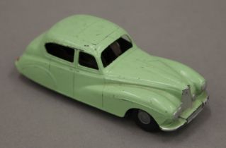 A Chad Valley clockwork car. 10.5 cm long.