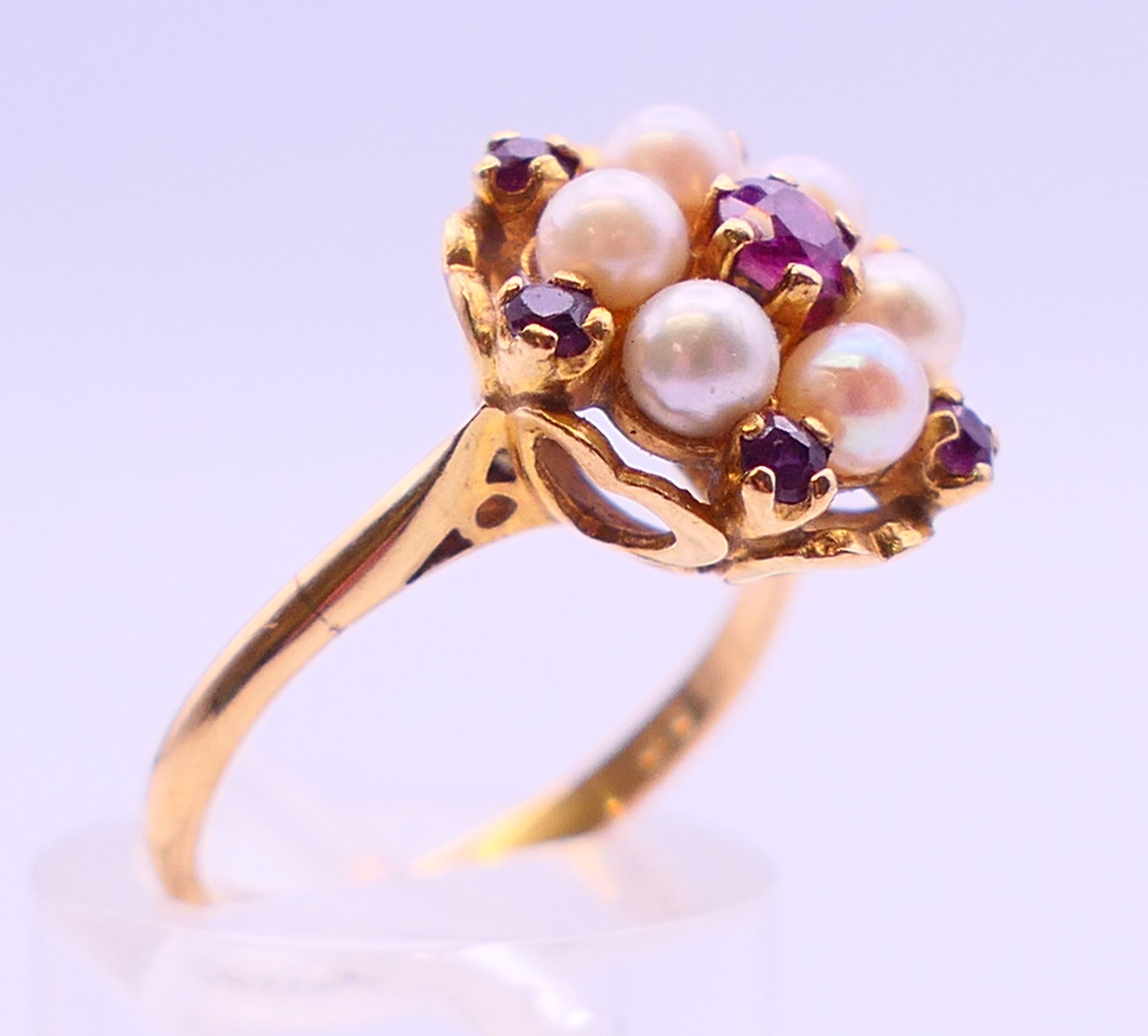 A 9 ct gold, pearl and ruby cluster ring. Ring size M. - Image 3 of 8