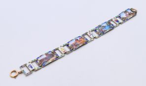 A silver enamel Egyptian Art Deco bracelet. 19 cm long.