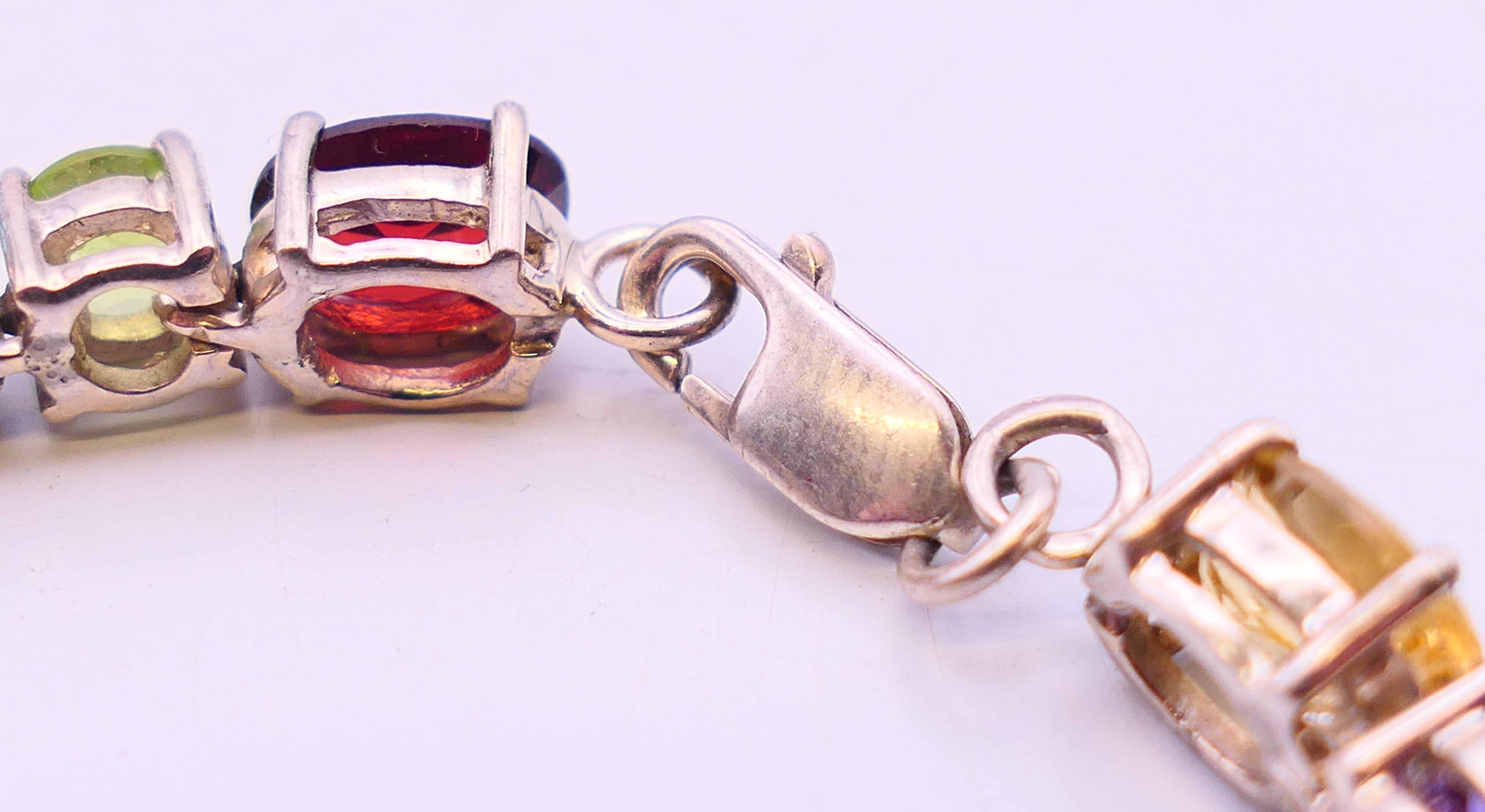 A silver multi gemstone bracelet. 19 cm long. - Image 3 of 4