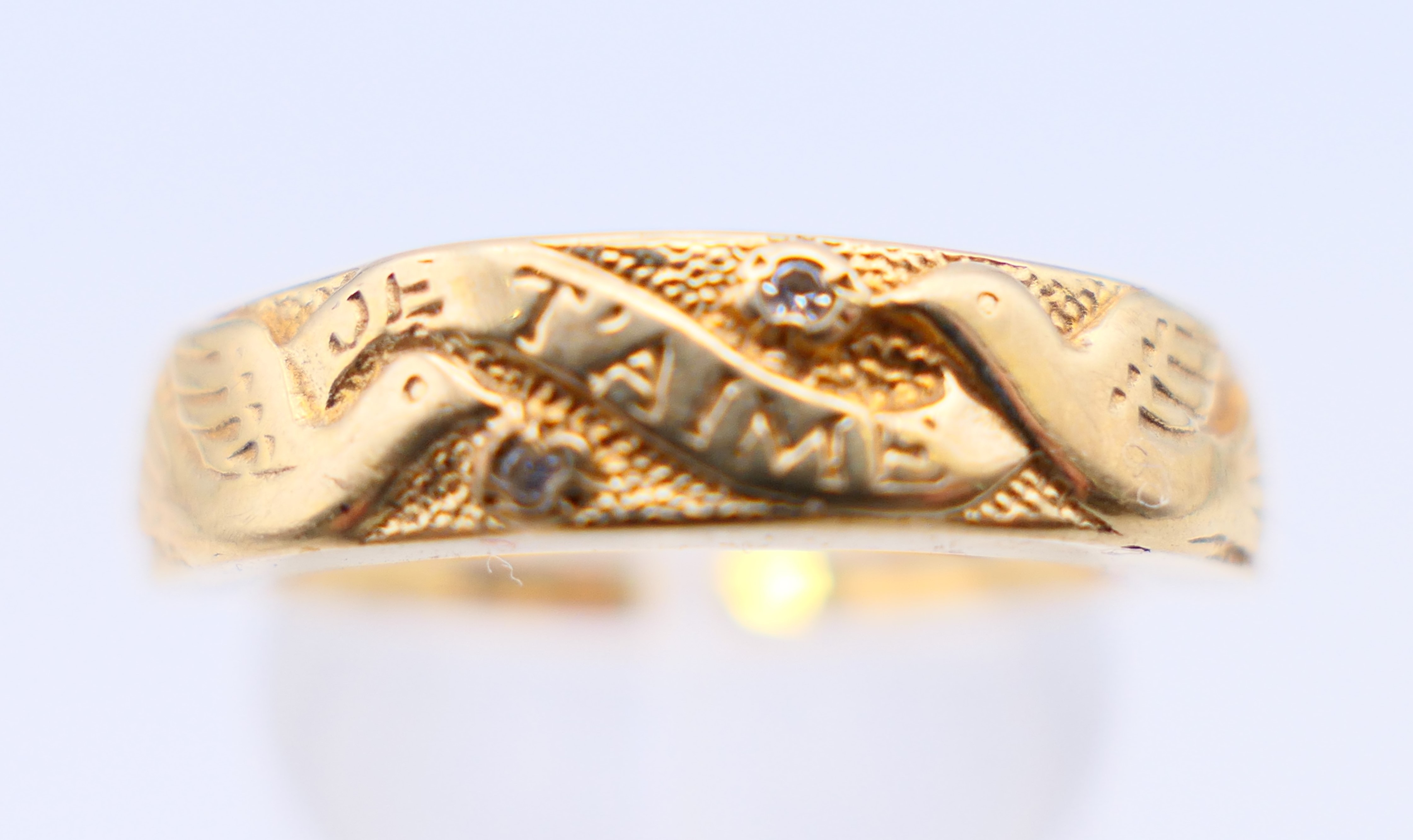A 9 ct gold and diamond ring with two doves and marked Je T'aime. Ring size Q/R. - Image 3 of 10