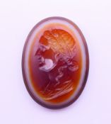 An antique banded agate intaglio carved with the profile of a Roman lady. 2.