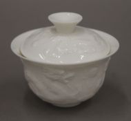 A Chinese blanc de chine porcelain tea cup and cover,