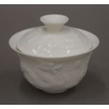A Chinese blanc de chine porcelain tea cup and cover,