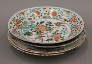 Four 18th century Chinese porcelain dishes. The largest 24 cm diameter.