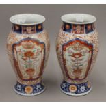 A pair of late 19th century Japanese Imari porcelain vases. 24.5 cm high.