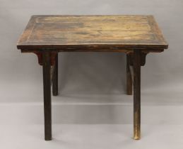 A 19th century Chinese side table. 100 cm long.