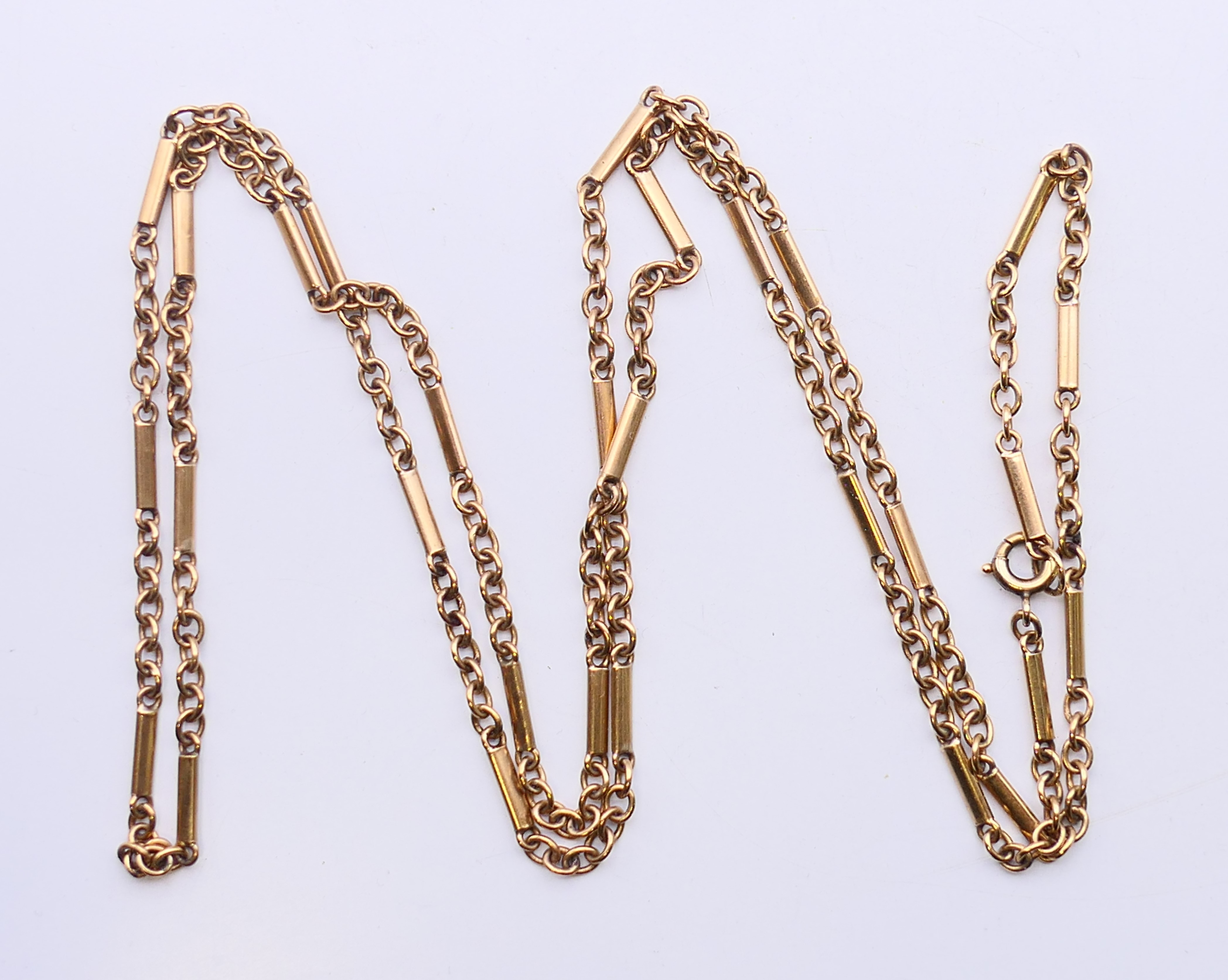 A 9 ct gold belcher and bar link chain. 76 cm long. 15 grammes.