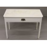A Victorian white painted side table. 91 cm wide.