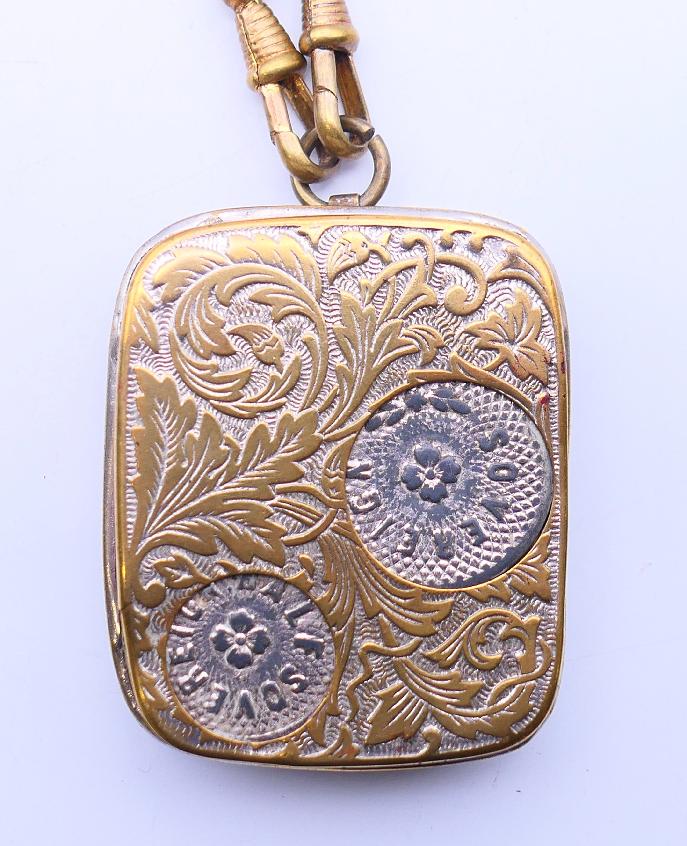An Edwardian coin dispenser on chain. 5 cm x 4 cm. - Image 2 of 5