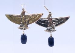 A pair of Egyptian revival silver earrings. 4.5 cm high.