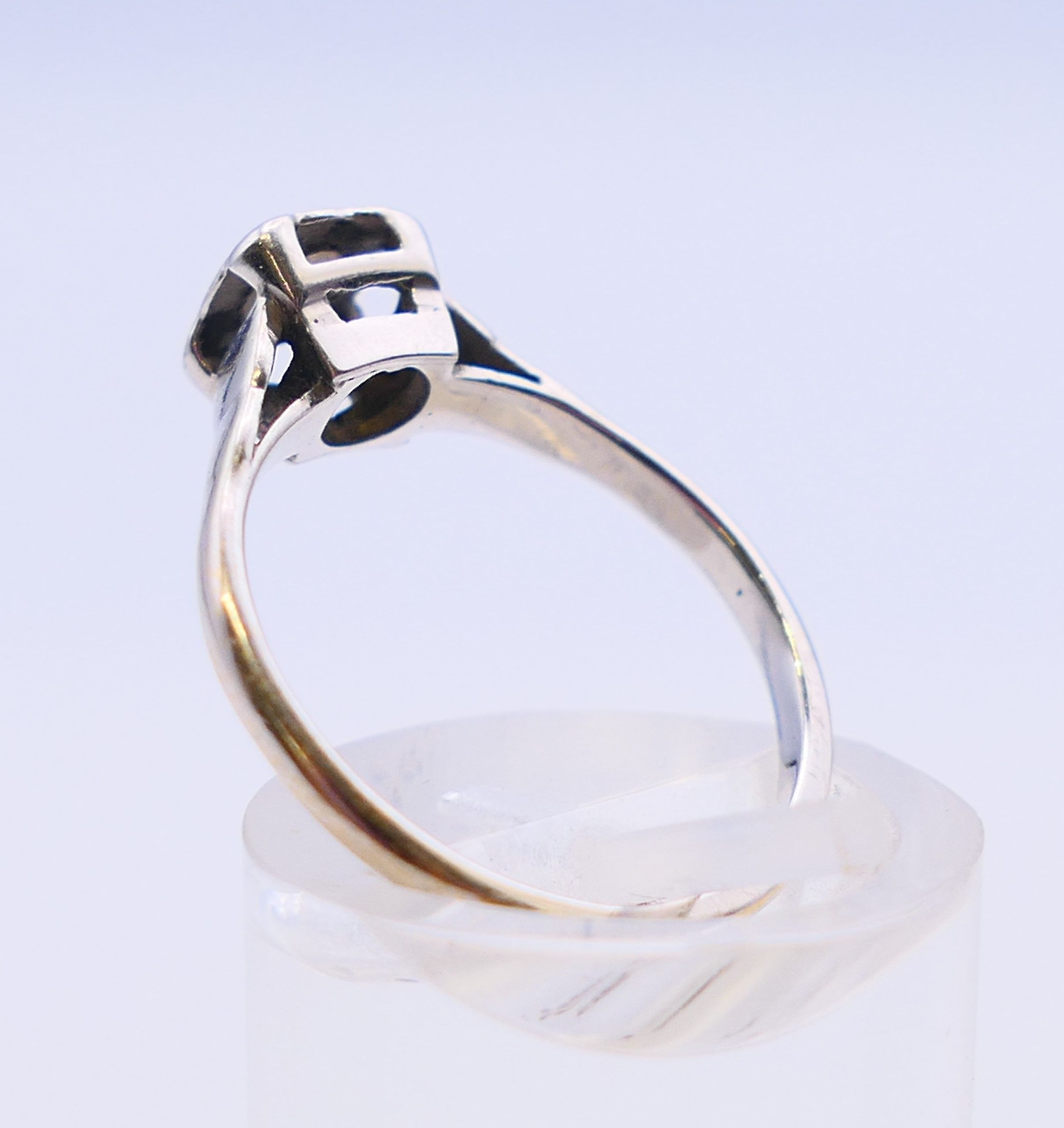 A platinum and diamond solitaire ring. Ring size L/M. - Image 5 of 8