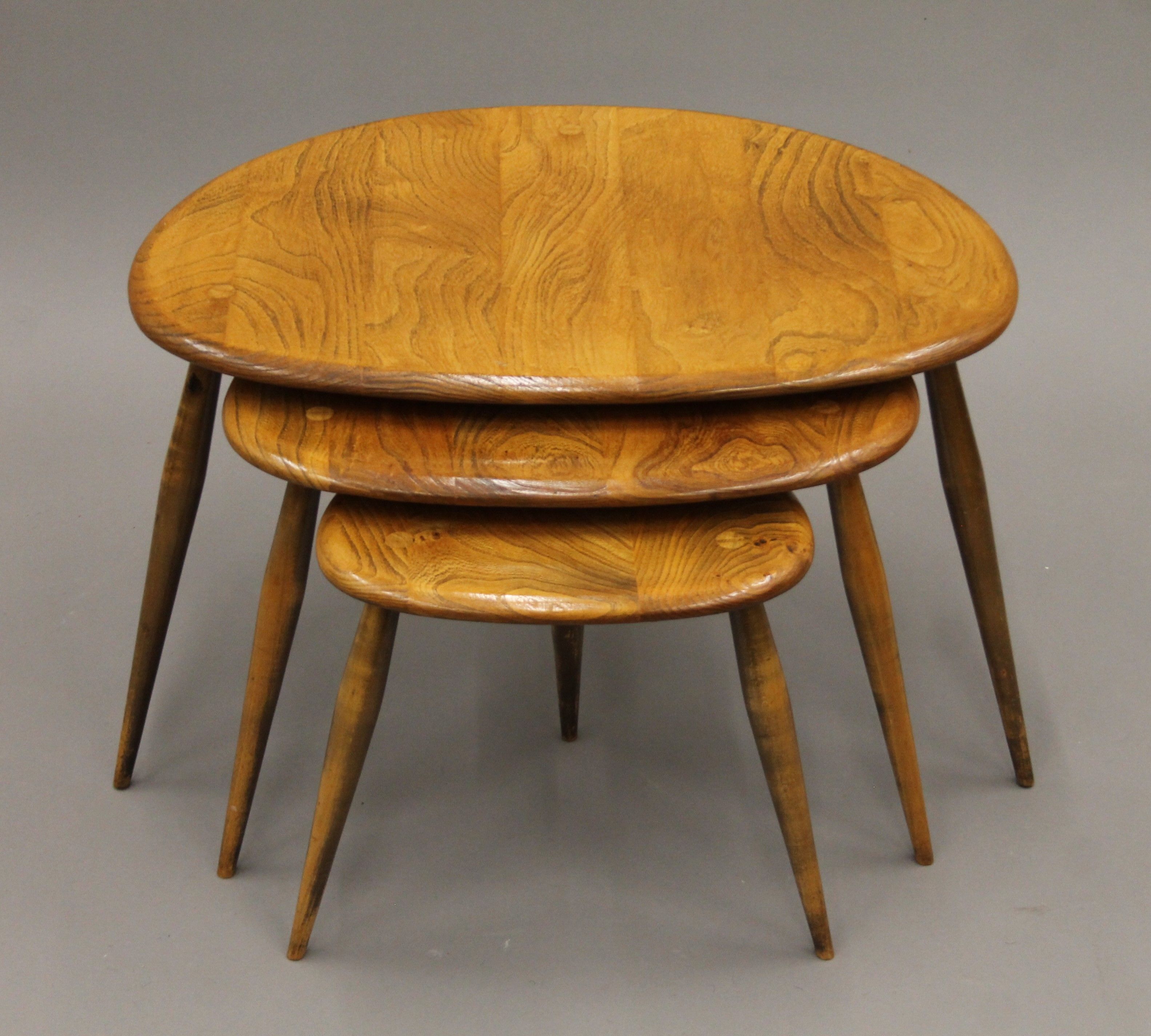 A nest of three Ercol pebble coffee tables. 46 cm wide. - Image 2 of 5