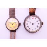 Two vintage wristwatches. The largest 3.5 cm diameter.