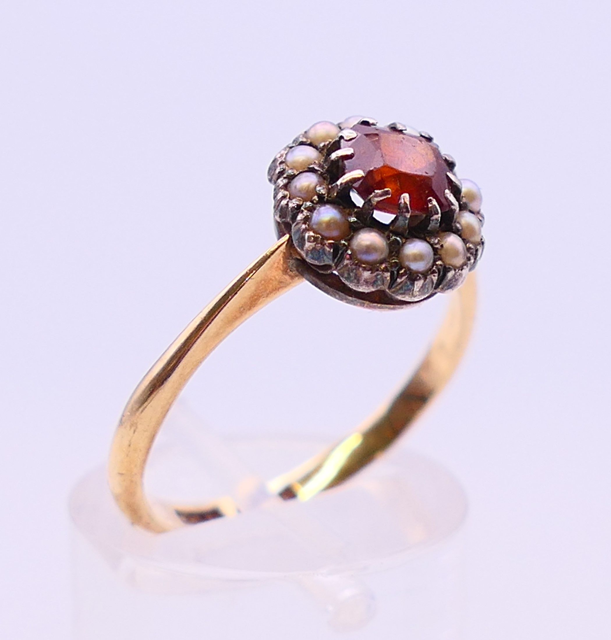 A 9 ct gold, seed pearl and garnet ring. Ring size O/P. - Image 3 of 7