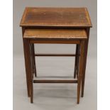 An Edwardian mahogany nest of two tables. 47.5 cm wide.