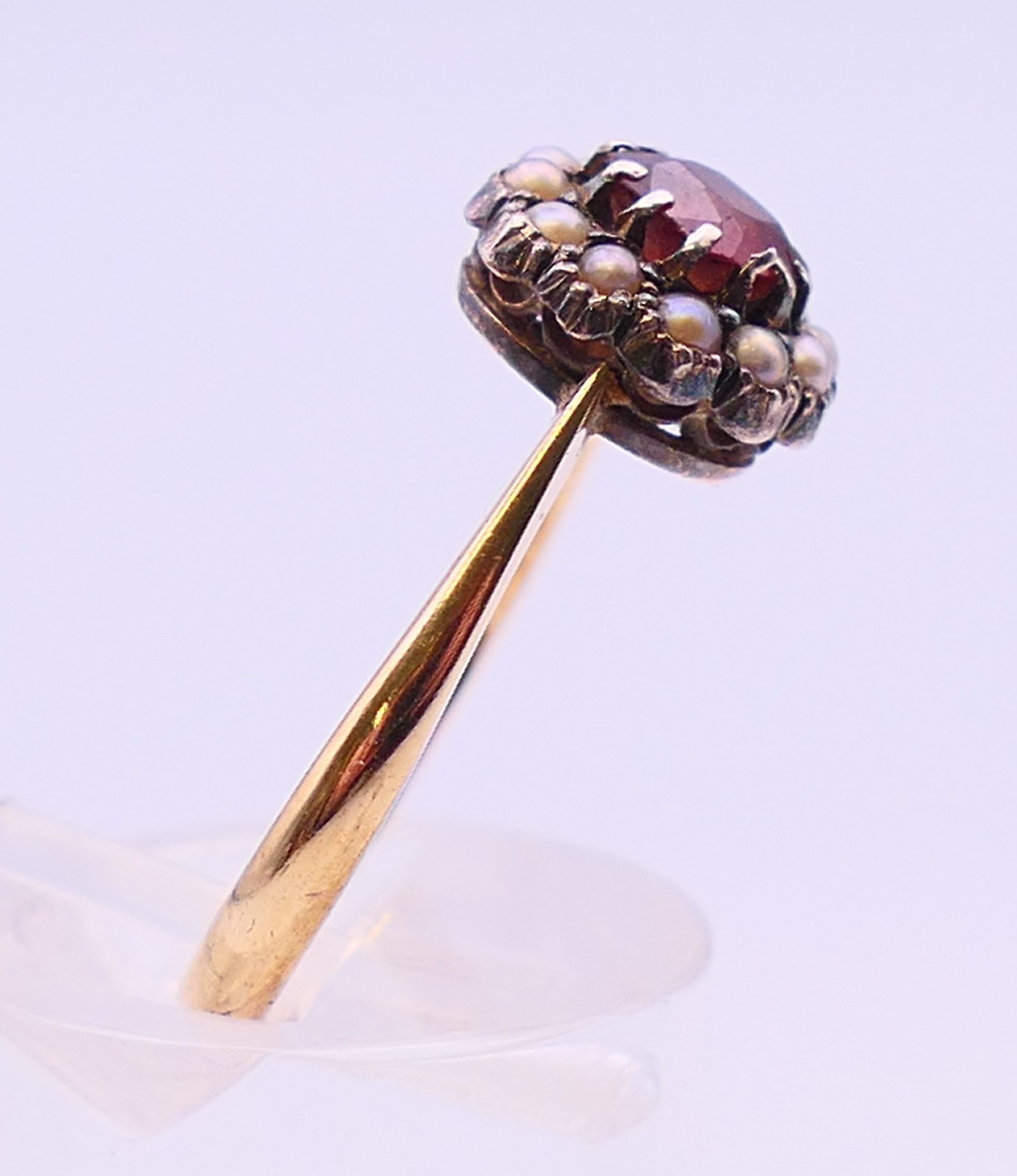 A 9 ct gold, seed pearl and garnet ring. Ring size O/P. - Image 4 of 7