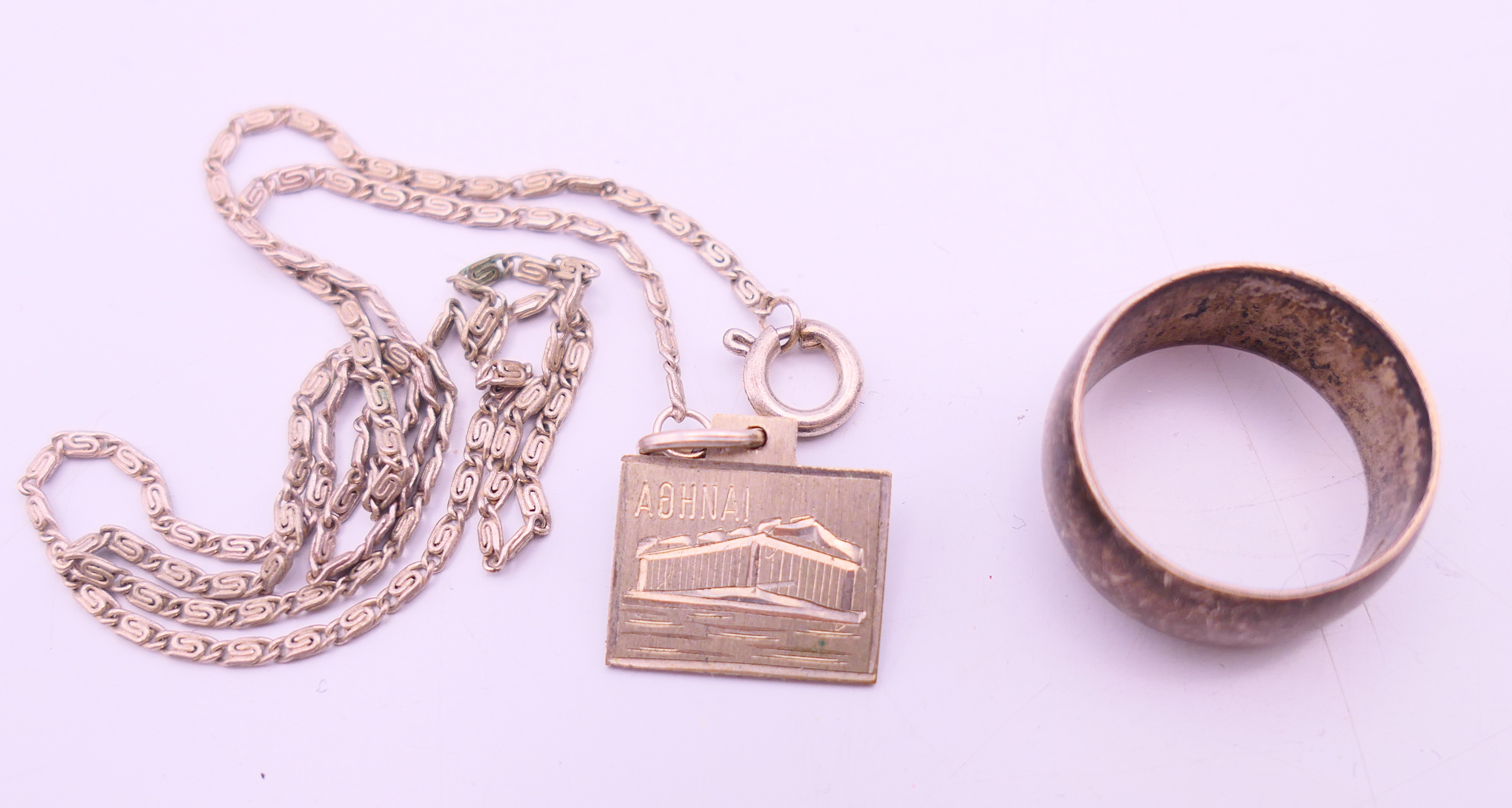 A small quantity of silver jewellery to include a ring, necklace, bracelet, fob and an owl pendant. - Image 6 of 7