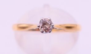 An 18 ct gold and platinum old cut single stone diamond ring, estimated 0.16 ct, SI2/I1.