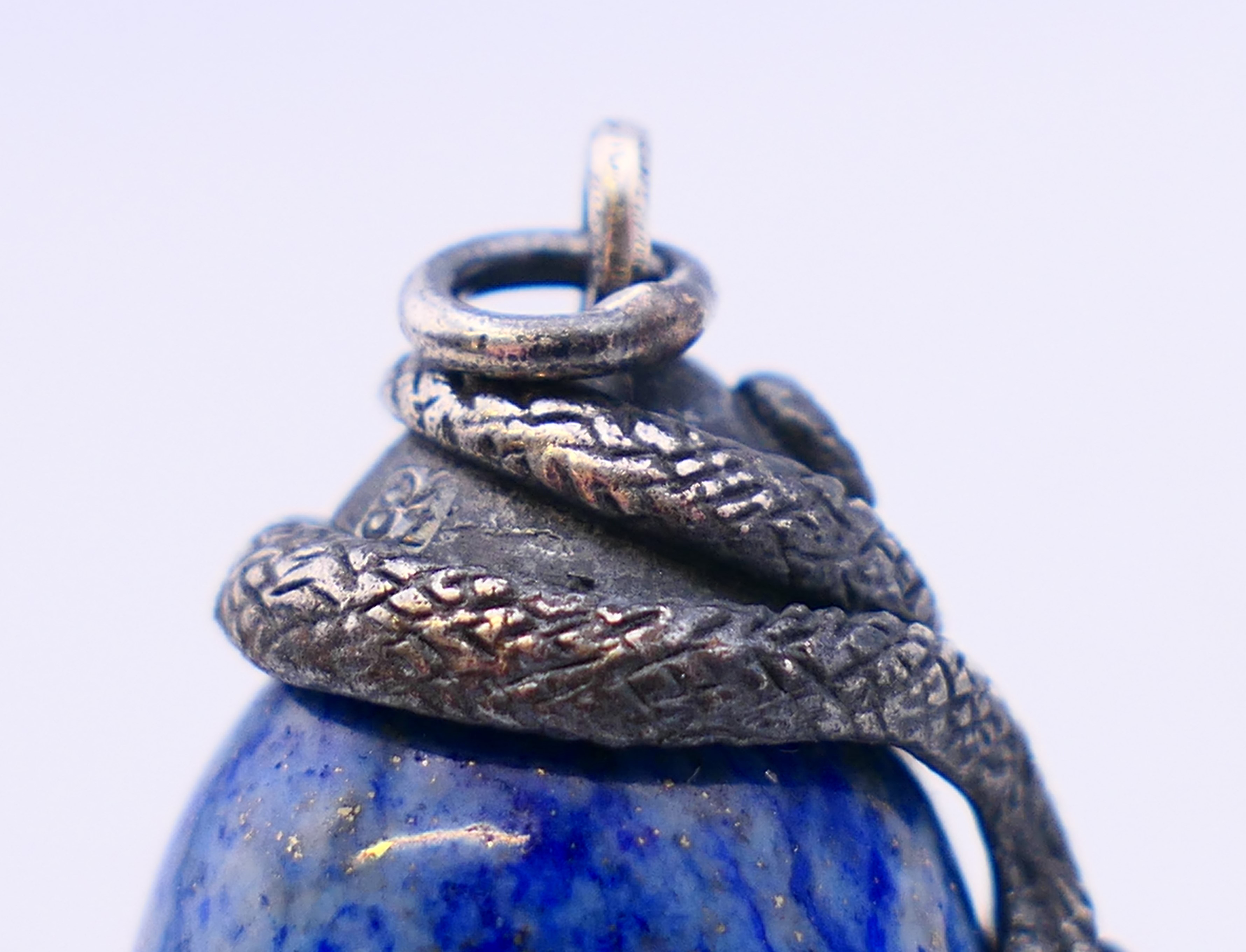 A silver and lapiz egg and snake pendant. 2.5 cm high. - Image 4 of 4