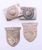 Two WWII German buckles and two shoulder plates. Buckles 6.5 cm x 4.5 cm, plates 7.5 cm high.