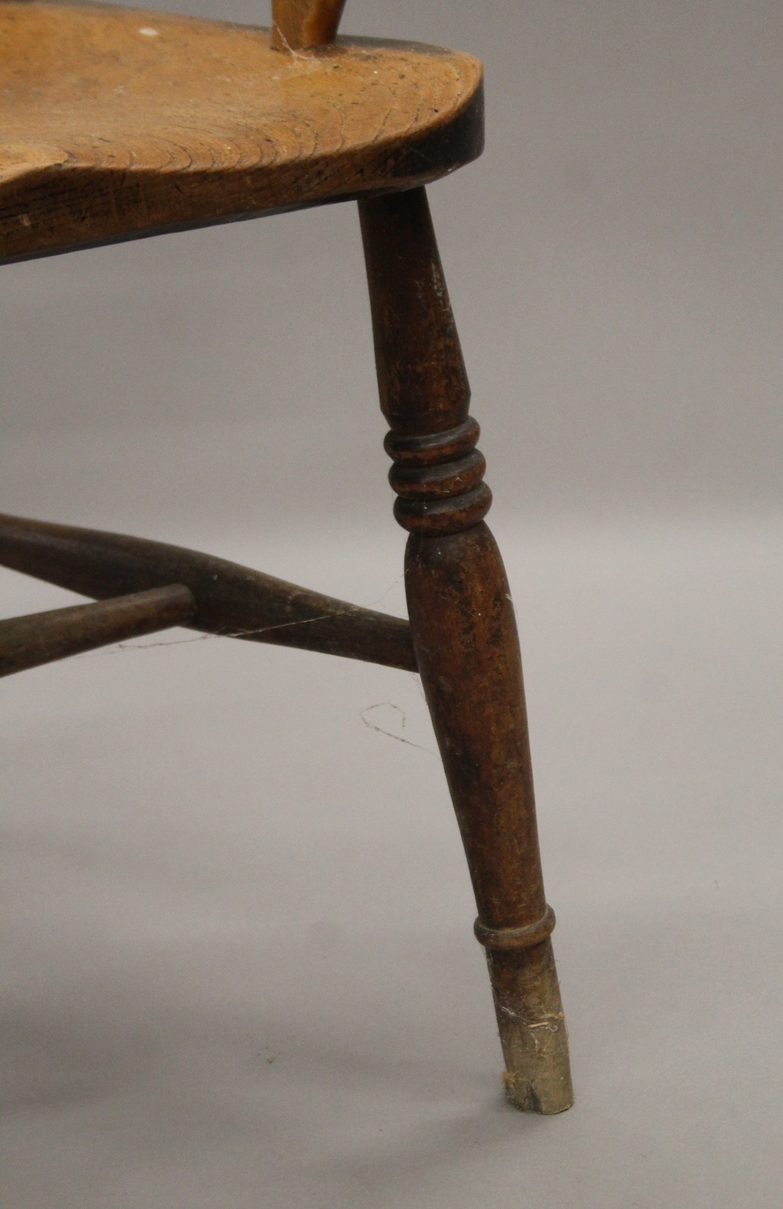 A 19th century elm seated open armchair. 56 cm wide. - Image 5 of 5