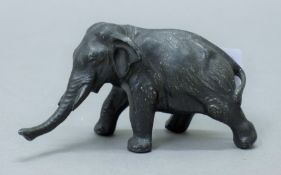 A small Japanese model of an elephant. 10.5 cm long.