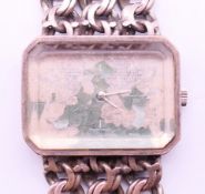 An Omega watch with silver strap (A/F). Watch 3 cm x 2.5 cm.
