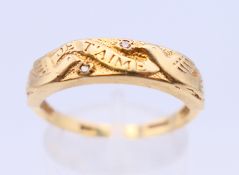 A 9 ct gold and diamond ring with two doves and marked Je T'aime. Ring size Q/R.