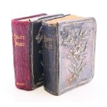 A small silver mounted prayer book and a small silver mounted Hymn book. Each 5.5 cm high.