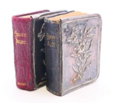 A small silver mounted prayer book and a small silver mounted Hymn book. Each 5.5 cm high.