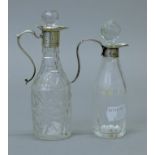 Two silver top cut glass oil and vinegar bottles, both with English silver marks. The tallest 14.