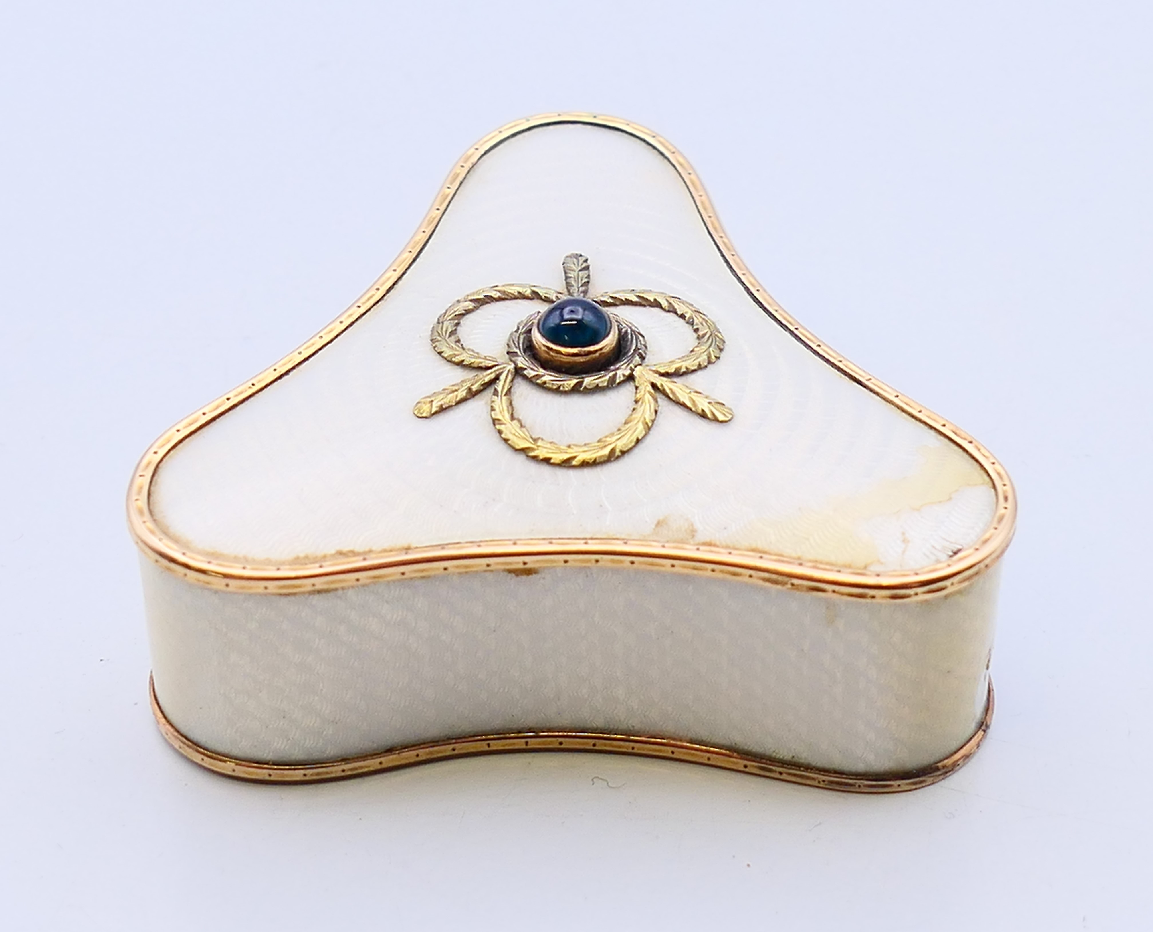 A Russian (attributed to Faberge) two-colour gold and silver gilt, sapphire set bell push,