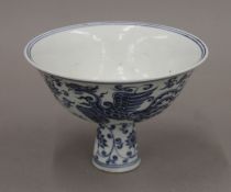 A Chinese blue and white stem cup. 10 cm high.