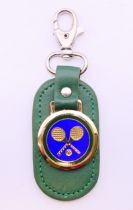 A Wimbledon Tennis Rolex keyring, in presentation box. 11 cm high overall.