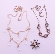A small quantity of costume jewellery to include two necklaces and a star form brooch. Brooch 3.