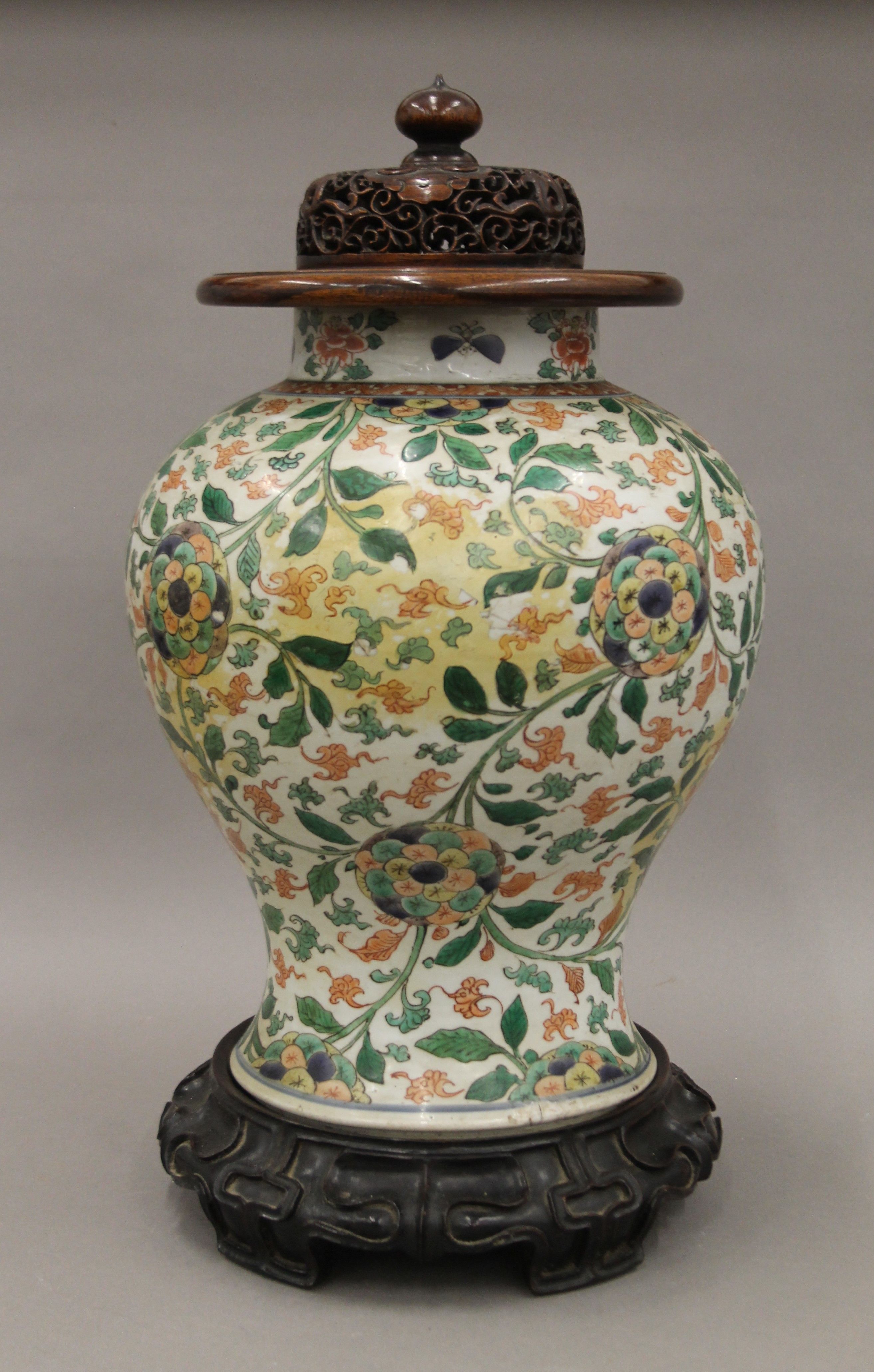 A 18th/19th century Chinese porcelain vase with pierced wooden lid and carved wooden stand. - Image 2 of 8