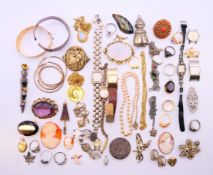 A box of various jewellery to include rings, necklaces, brooches, etc.