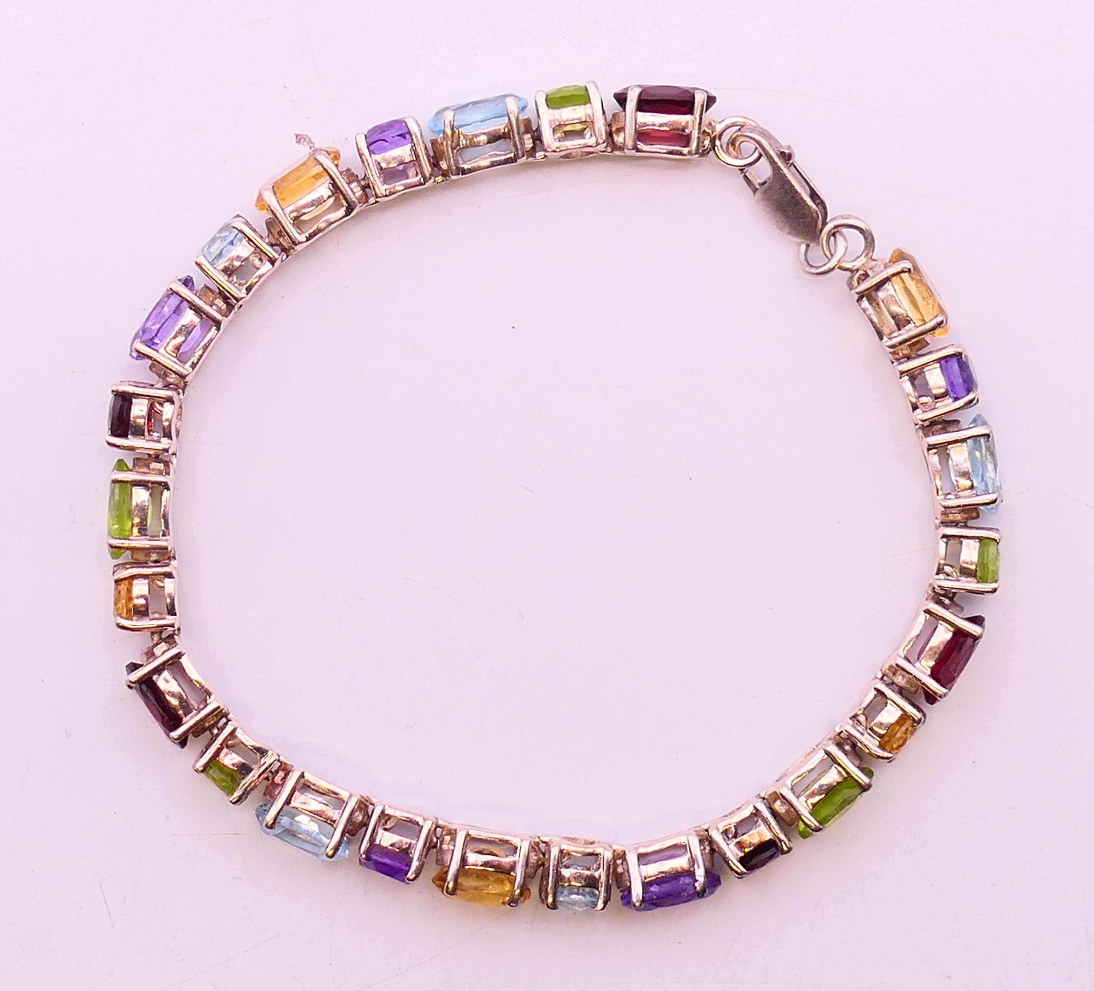 A silver multi gemstone bracelet. 19 cm long. - Image 4 of 4
