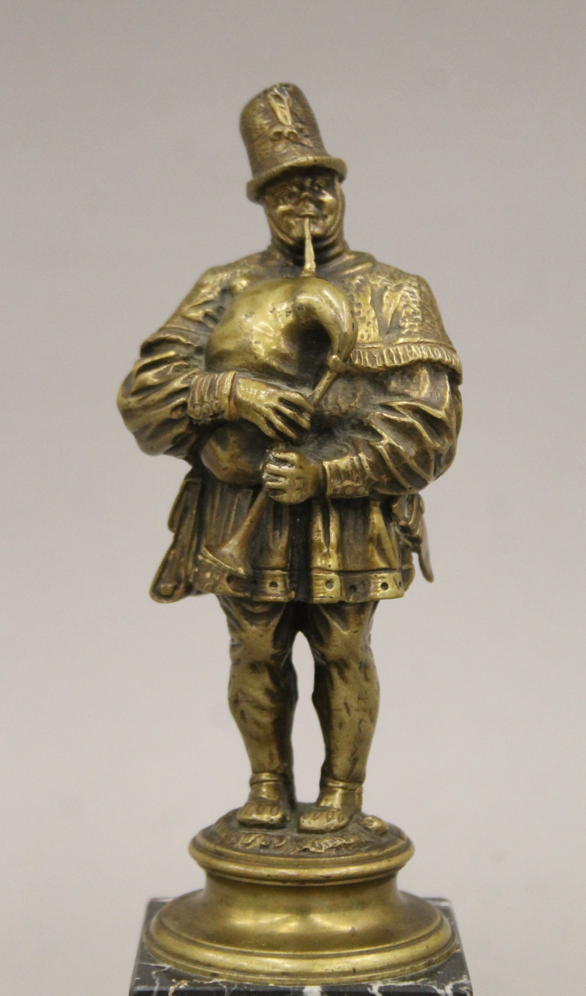 A 19th century gilt bronze figure of a bagpiper on a marble base. 21.5 cm high overall. - Image 2 of 6