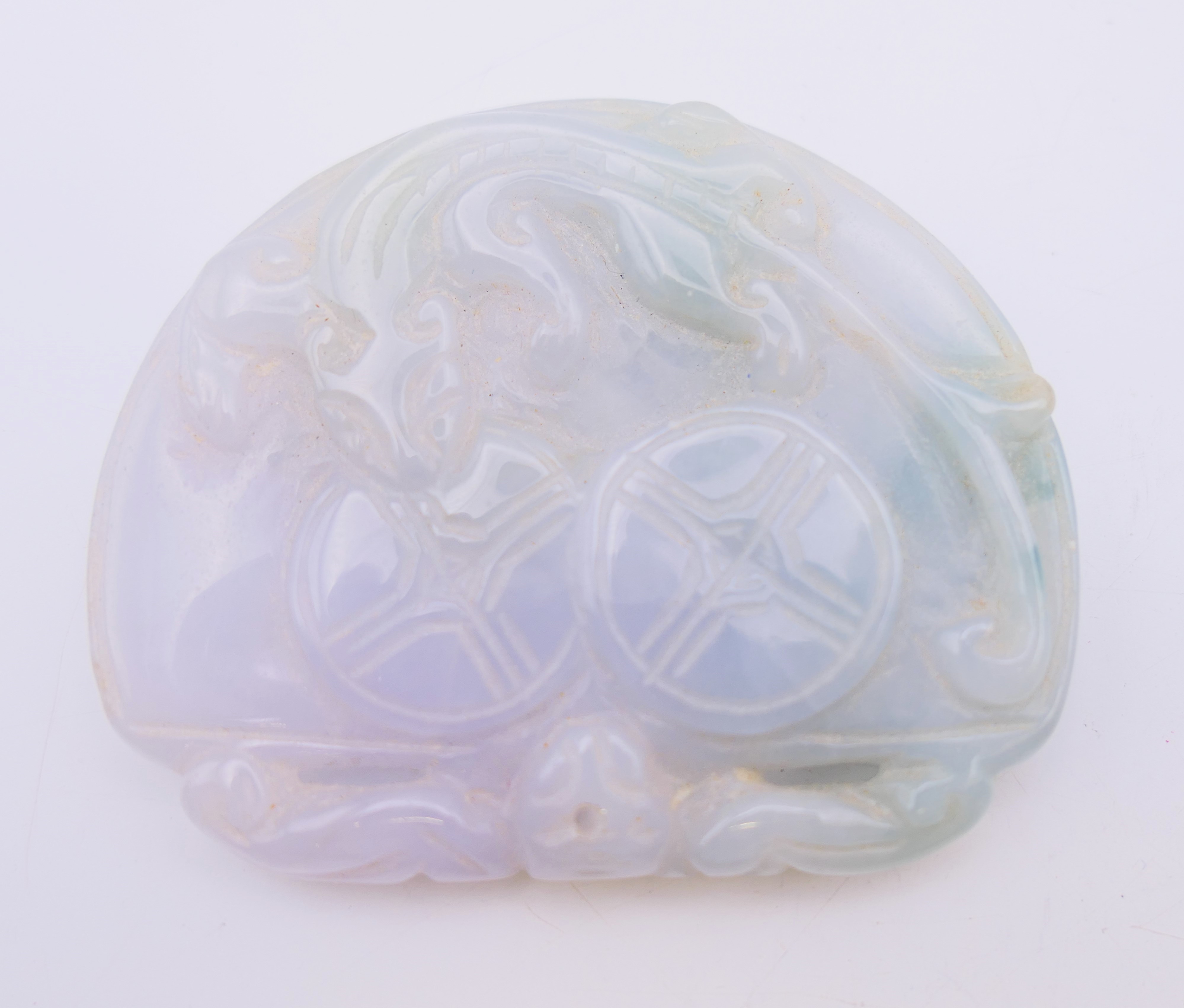 A Chinese jade pendant. 5.5 cm x 4.5 cm.