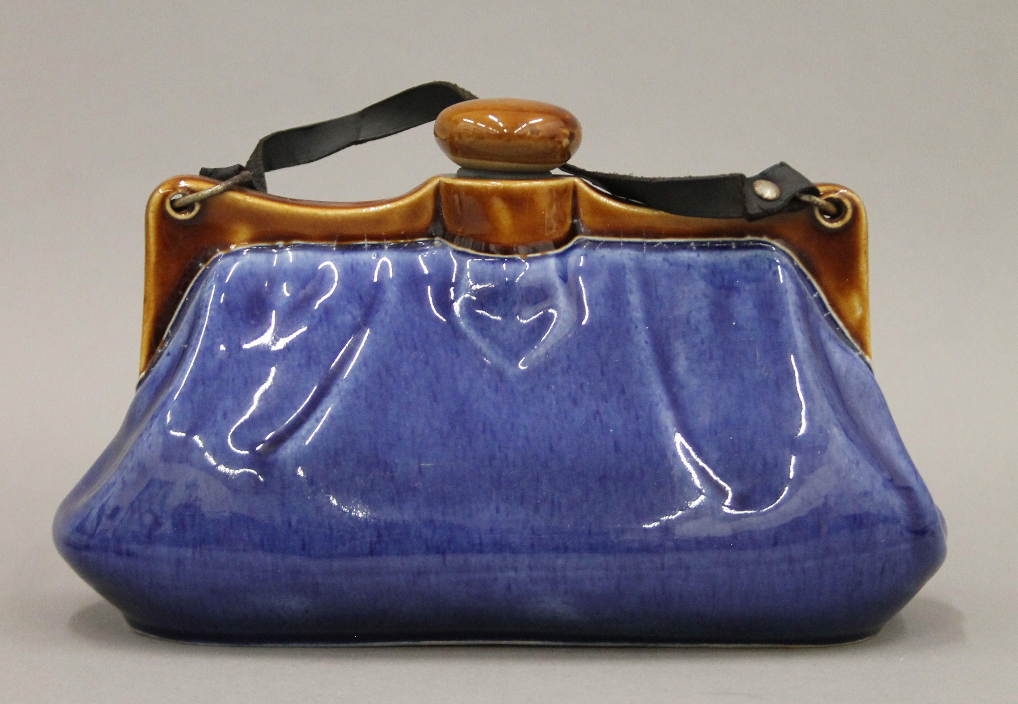 A Bourne Denby stoneware hot water bottle in the form of a ladies handbag. 25 cm long. - Image 2 of 4