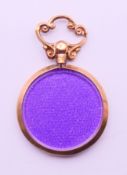 A 9 ct gold double photo locket pendant. 3.5 cm high including suspension loop.