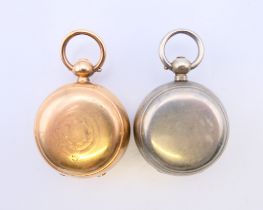 A gold filled sovereign case and a silver plated sovereign case. Each 3 cm diameter.