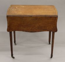 A George III mahogany Pembroke table. 47 cm wide flaps down.
